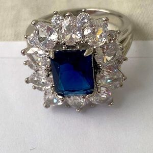 Beautiful, new ,blue tanzanite and CZ  925 silver ring size 7